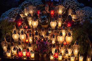 Candles on a Grave on All Souls' Day